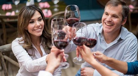 Toasting Red Wine Glasses | Cheers Okanagan Tours and Transportation Kelowna Wine Tours, Myra Canyon Tours, Airport Transportation | Cheers! Okanagan Tours and Transportation